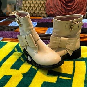 RED V off white booties with awesome bow and gold buckle. Pull on. Size 37 UK.